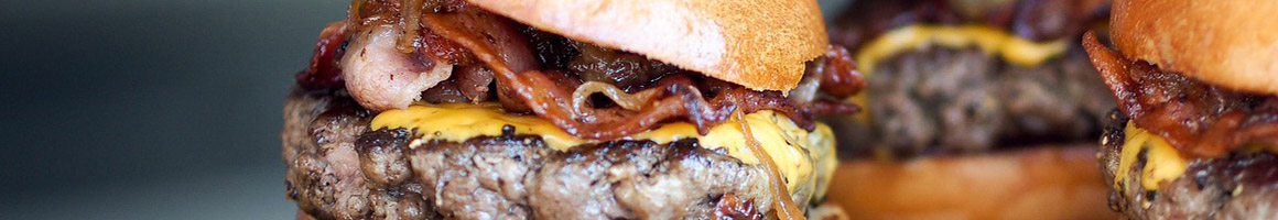 Eating American (Traditional) Burger at Boudreux Burger Barn restaurant in Peck, KS.